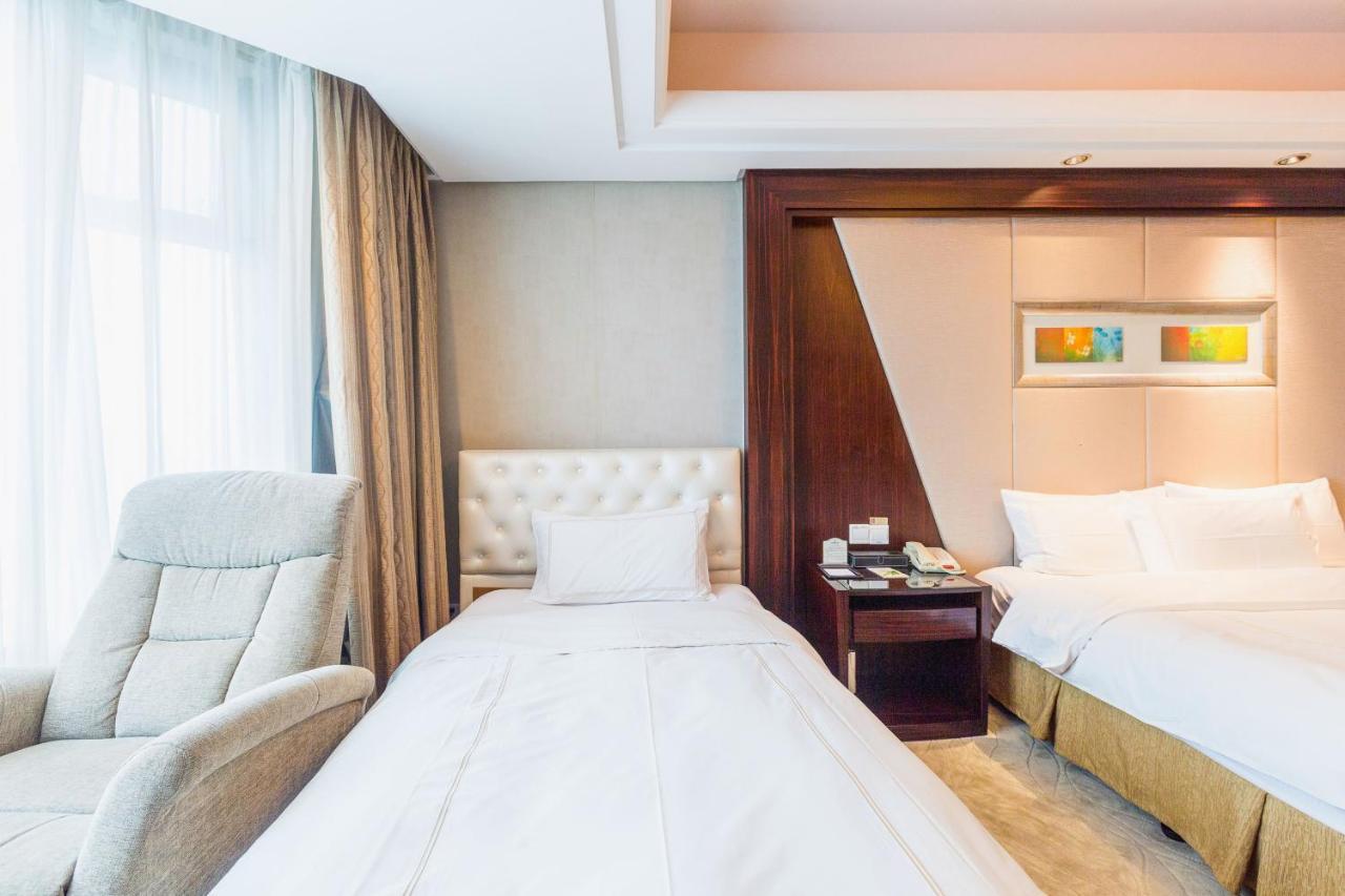 Shu Guang International Hotel Нанкин Экстерьер фото